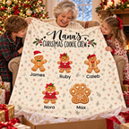 Nana unwrapping her Christmas Cookie Crew blanket with her grandkids