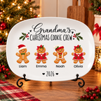 Grandma's Christmas Cookie Crew personalized platter on a black metal display stand in a Christmas kitchen
