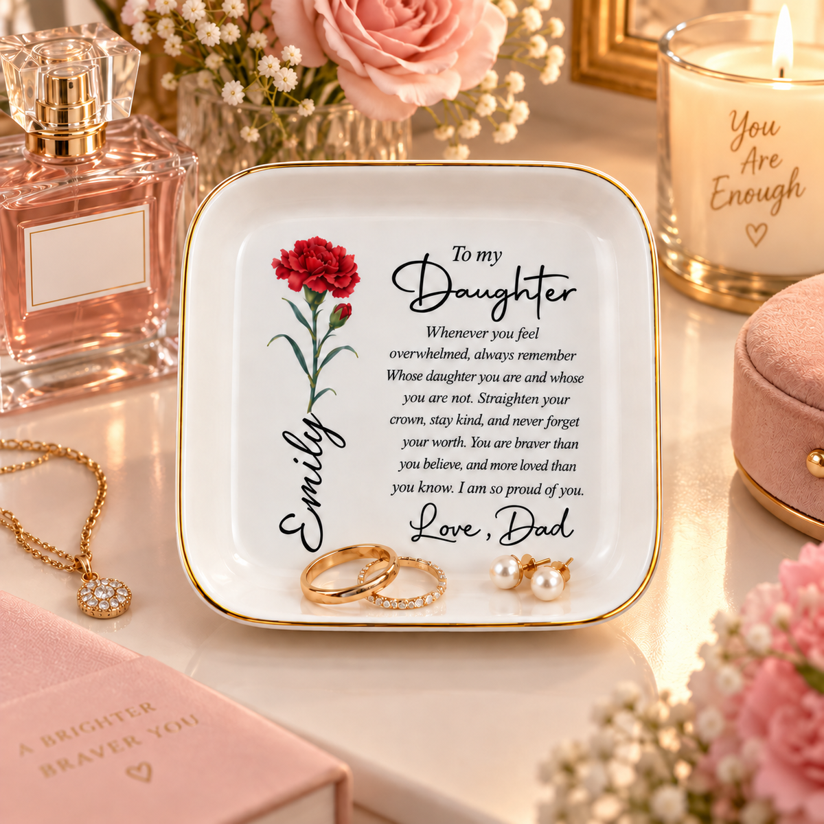 To My Daughter personalized birth flower jewelry dish on vanity with rings and pearl earrings, name Emily with carnation