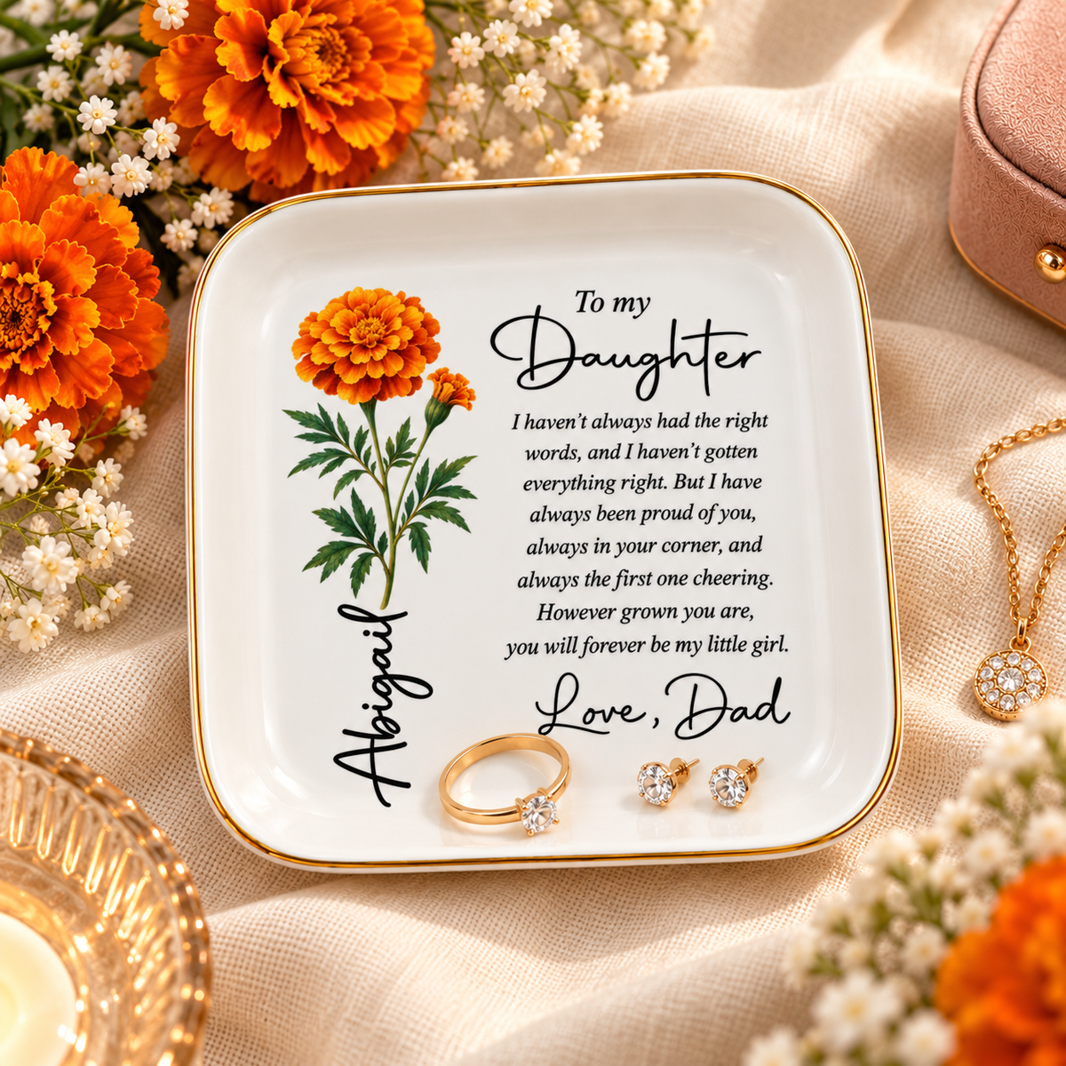 Personalized birth flower jewelry dish holding a ring and earrings