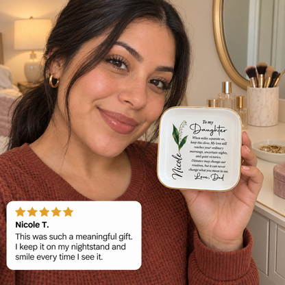 Daughter smiling with personalized long distance jewelry dish gift from Dad, 5-star customer review