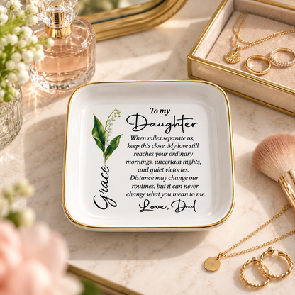 Personalized long distance daughter jewelry dish on vanity with jewelry and perfume