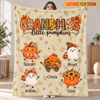 Grandma's Little Pumpkins personalized blanket in Tan held up in a living room, with 5 grandkids' names