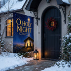 O Holy Night nativity house flag beside a black arched Tudor door with a berry wreath