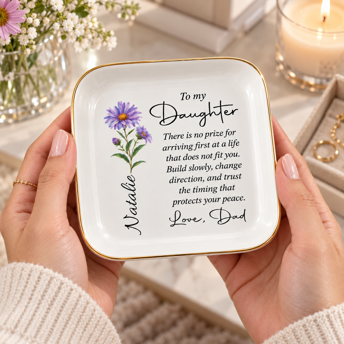 Hands holding personalized To My Daughter jewelry dish with birth flower and name