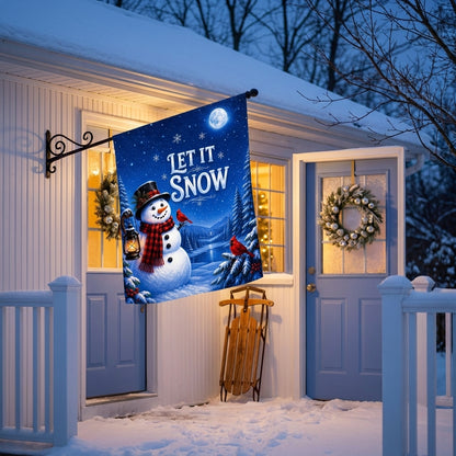 Let It Snow house flag beside a pale blue cottage door with a sled and wreath