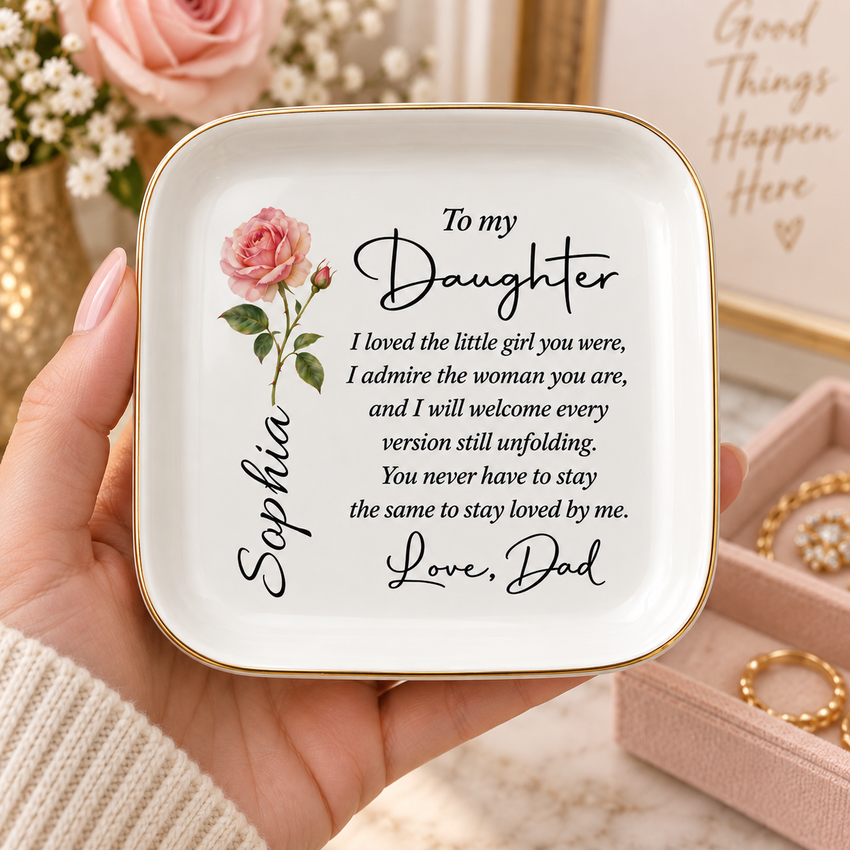 Hand holding personalized To My Daughter jewelry dish with birth flower and name