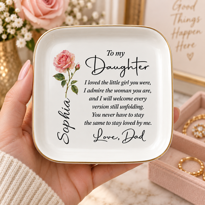 Hand holding personalized To My Daughter jewelry dish with birth flower and name