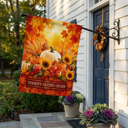 Thankful Grateful Blessed house flag on a bracket beside a navy front door