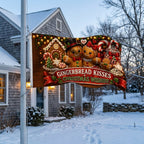 Gingerbread Kisses Christmas Wishes 3x5 ft flag rippling on a flagpole outside a grey saltbox in snow